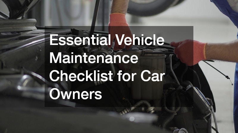 man inspecting a car's engine with the hood open
